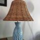 Blue ceramic lamp and rattan