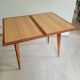 Mid-century Scandinavian compass leg coffee table