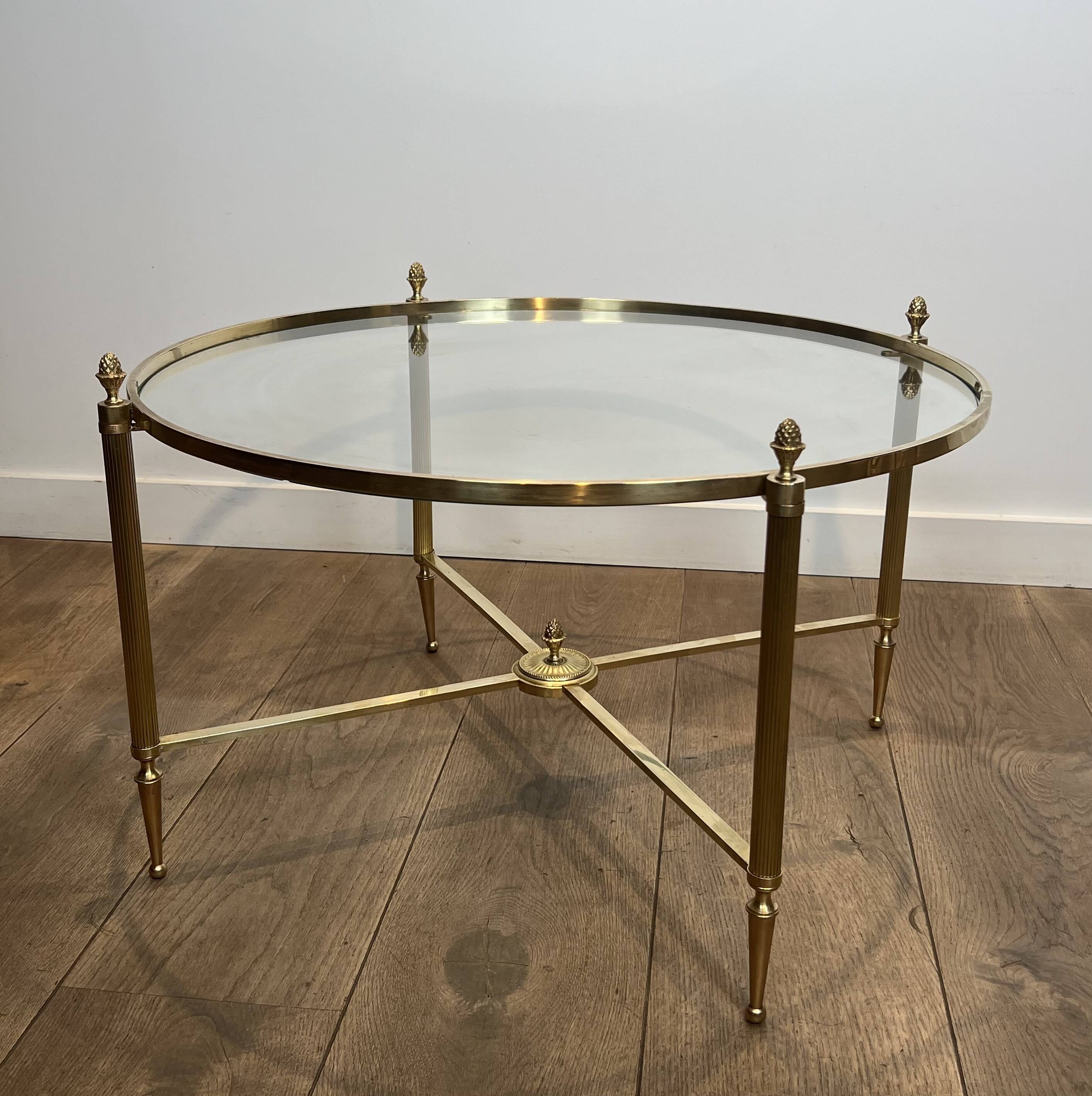 Neoclassical Round Coffee Table in Brass with Fluted Supports and Floral Motifs