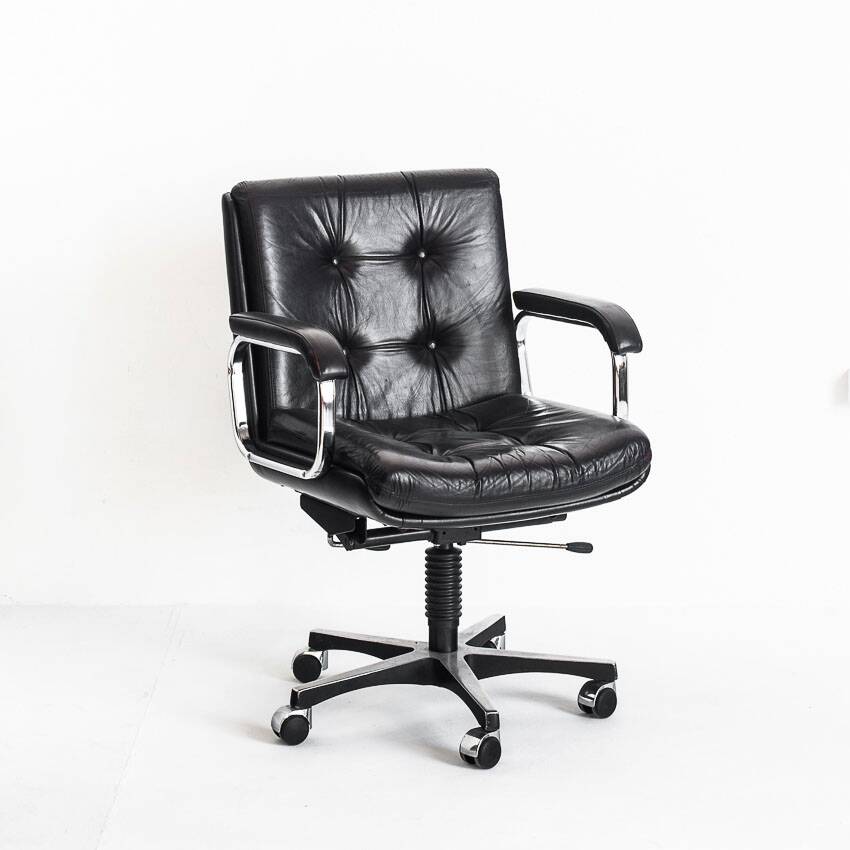 Vintage leather armchair. Swivel, on casters, multi-position. Norway, 1970s.