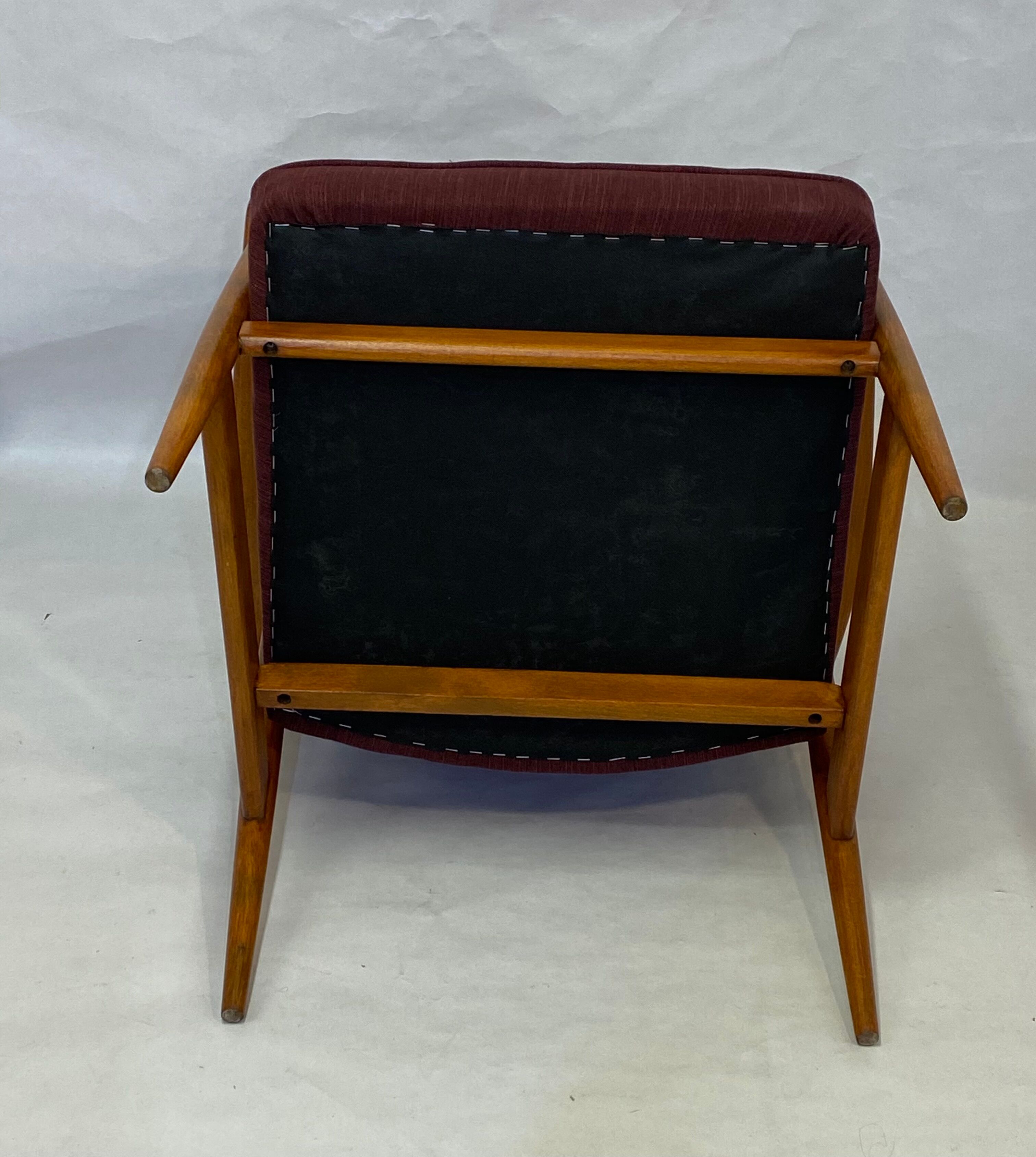 Chair created by Mr. Zieliski year 60 burgundy fabric.