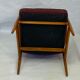 Chair created by Mr. Zieliski year 60 burgundy fabric.