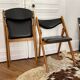 2 folding chairs wood and skaï