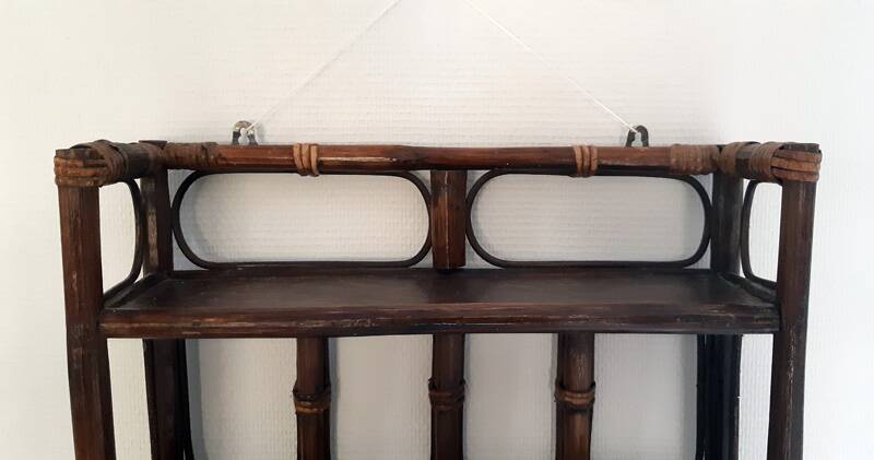 Rattan wall shelf from the 70s.