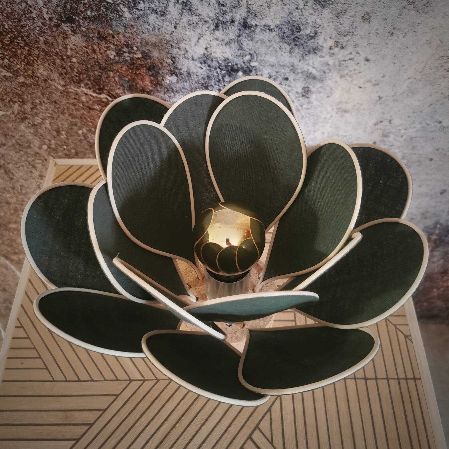 Flower table lamp made of rattan and fir green linen petals