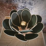 Flower table lamp made of rattan and fir green linen petals
