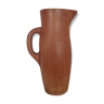 Large pitcher has old wooden wine