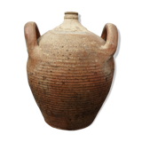 Old terracotta pot with two handles