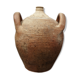 Old terracotta pot with two handles