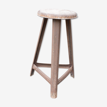 Old industrial stool in metal