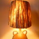 Lamp with sandstone handles