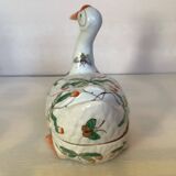 Large bird pocket emptier with butterflies and flowers.