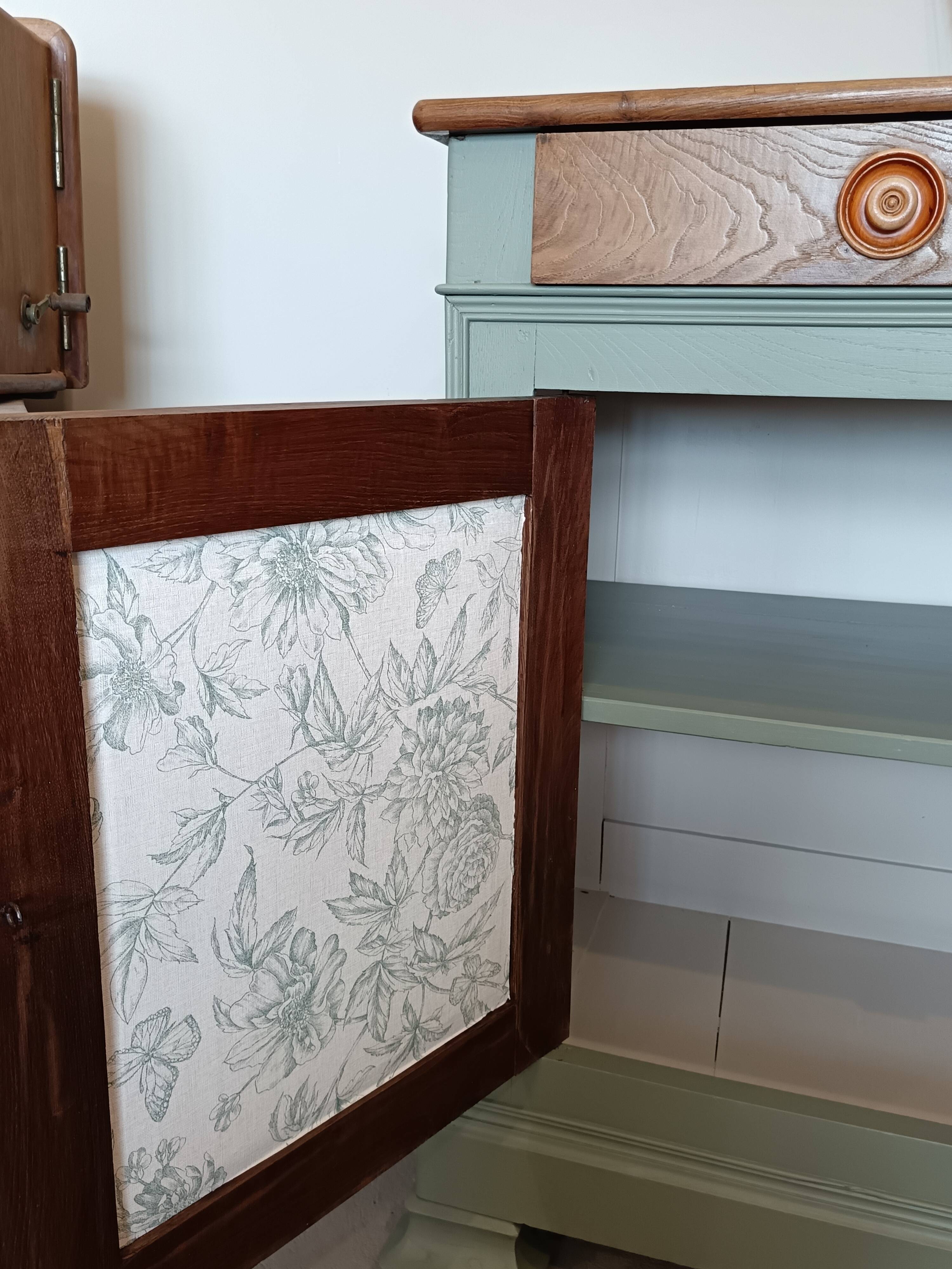 Buffet made of natural wood and bronze green.