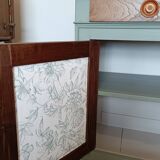 Buffet made of natural wood and bronze green.