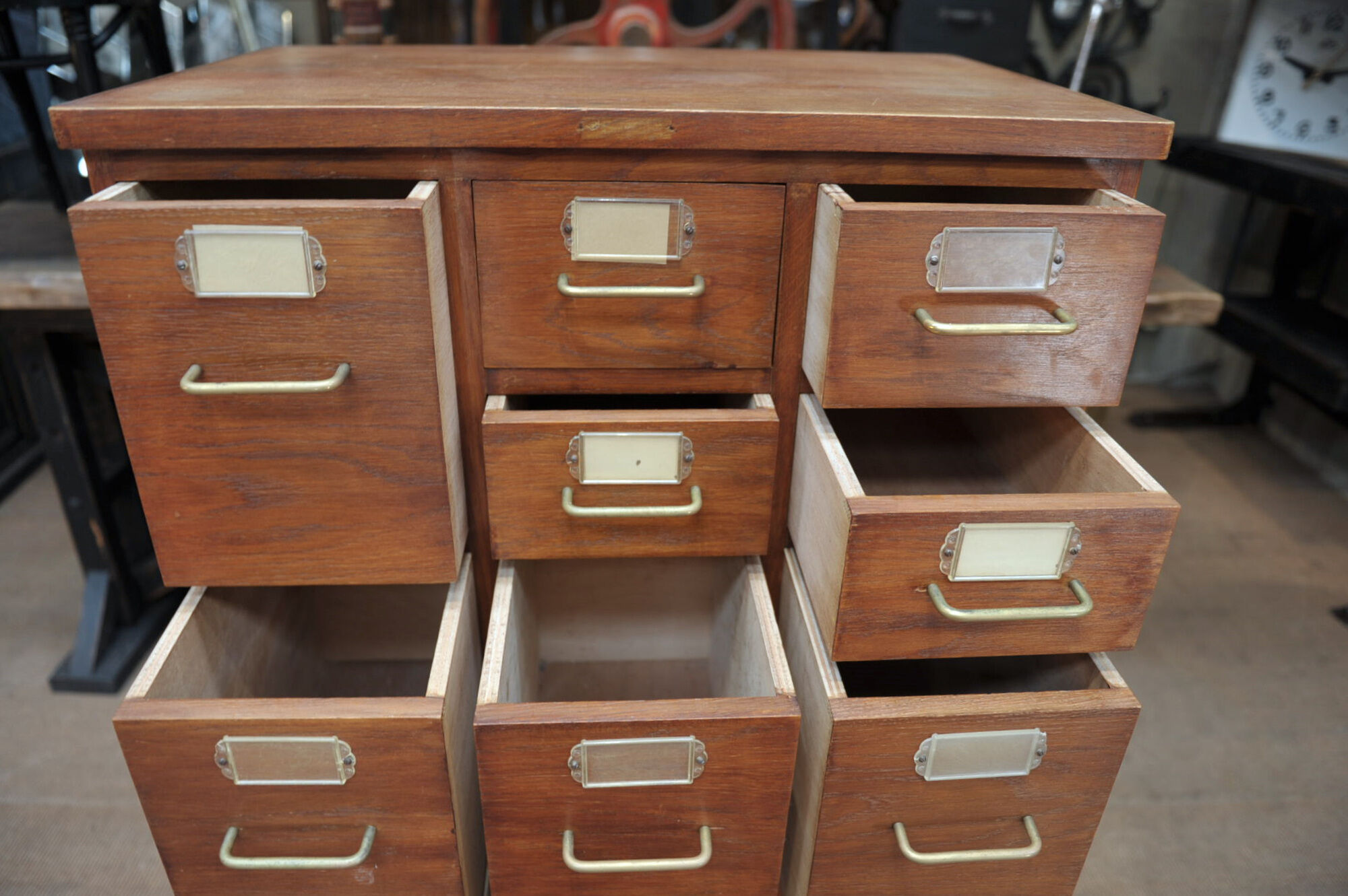 Office furniture has oak drawers 1950 brass handles and label holders