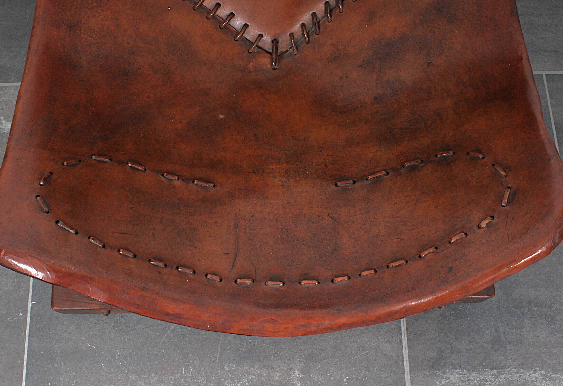 Brutalist oak lounge chair and ottoman, 1970s, set of 2