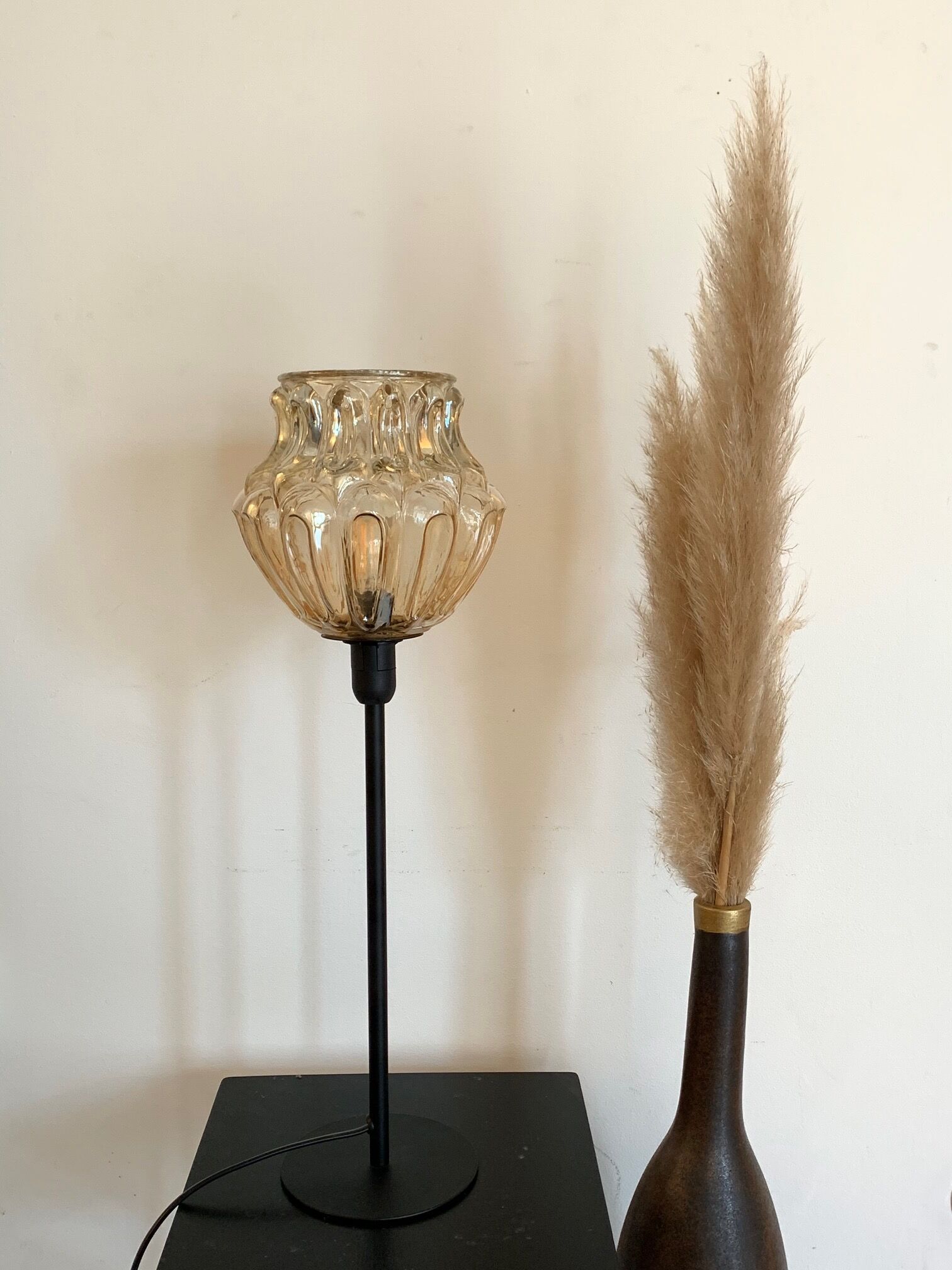 Table lamp with an old vintage golden lampshade