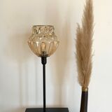 Table lamp with an old vintage golden lampshade