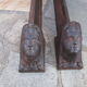 Pair of ancient cast iron channels, antique heads