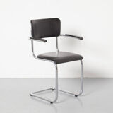 Tubax cantilever chair with black armrest