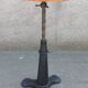 Height-adjustable leather stool with cast iron base