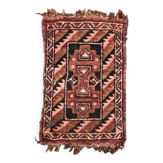 Small handmade Persian rug