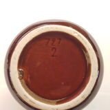 Vintage pitcher in enamelled sandstone from the 1960s