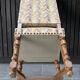 Restored and reupholstered antique chair with character
