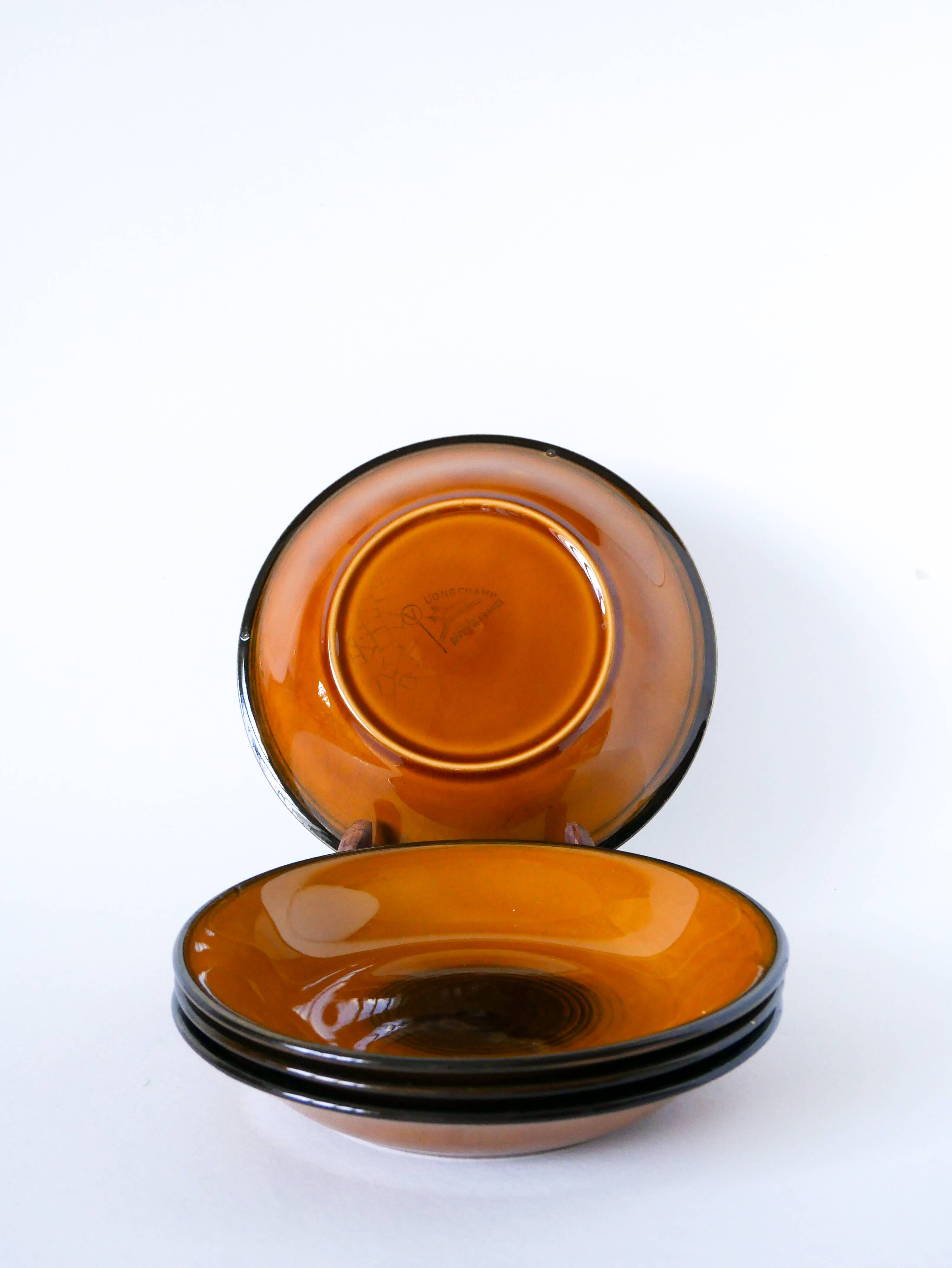 Set of 4 glazed ceramic deep plates, Longchamp, 1960