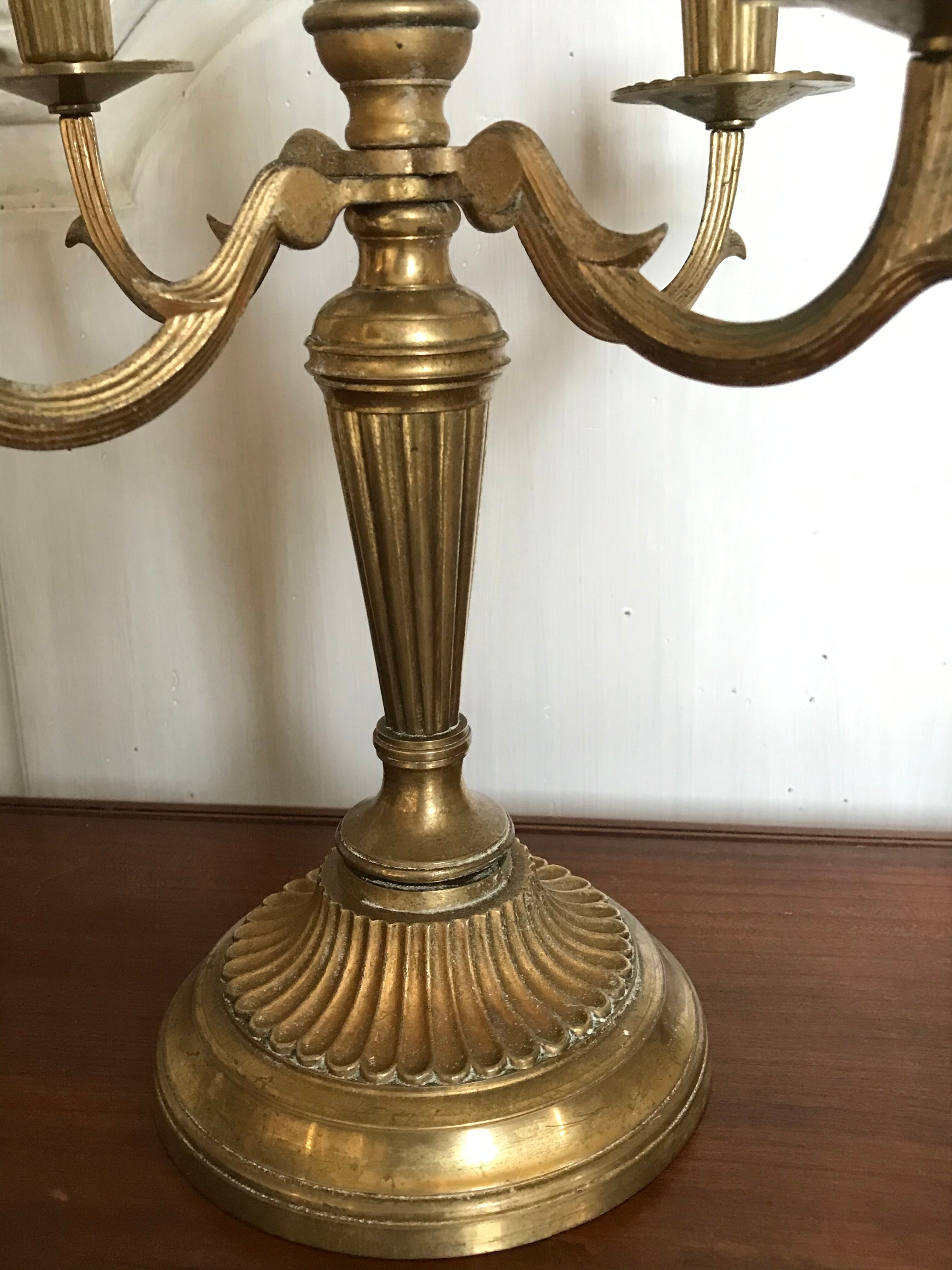 Pair of golden brass candlesticks