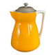 Antique teapot in earthenware with a tin filter lid.