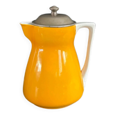 Antique teapot in earthenware with a tin filter lid.