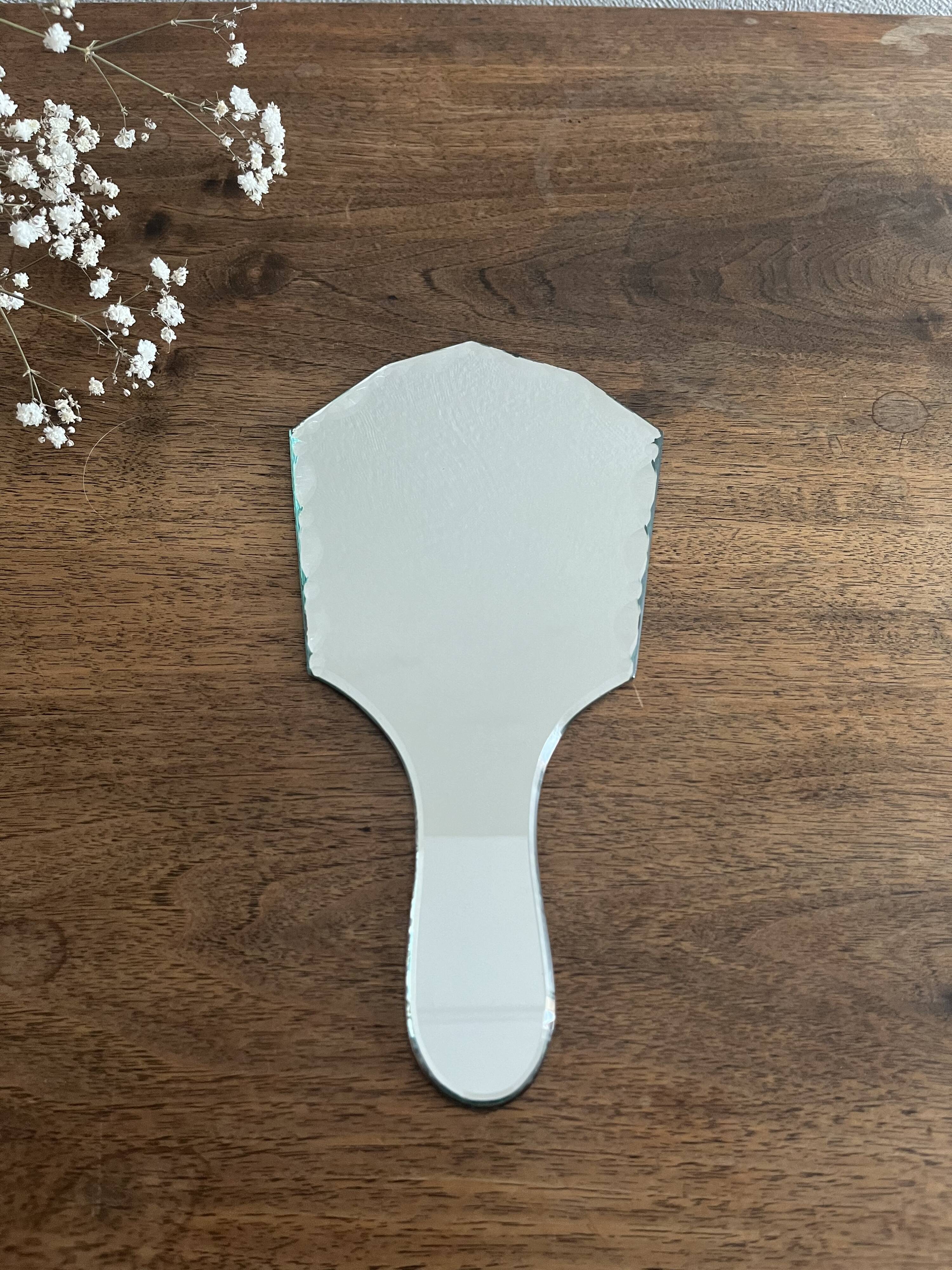 Beveled hand mirror