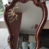 Pretty Baroque style mirror / Louis XV patinated with pink / golden copper reflections. Volutes, leafy shells