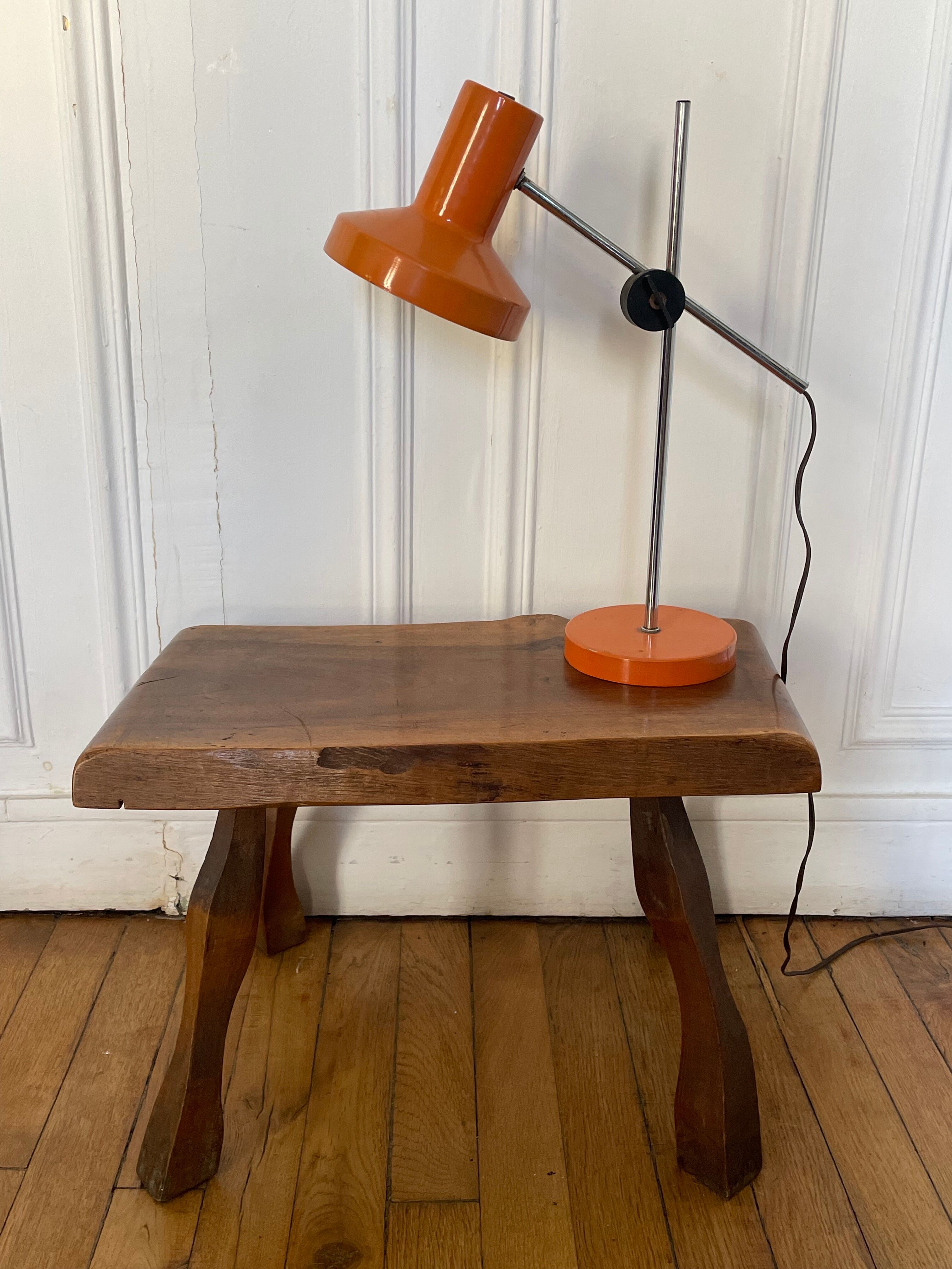 Orange articulated lamp design 1970