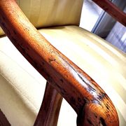 Wingback armchair in walnut in the French Regency style with stretcher in