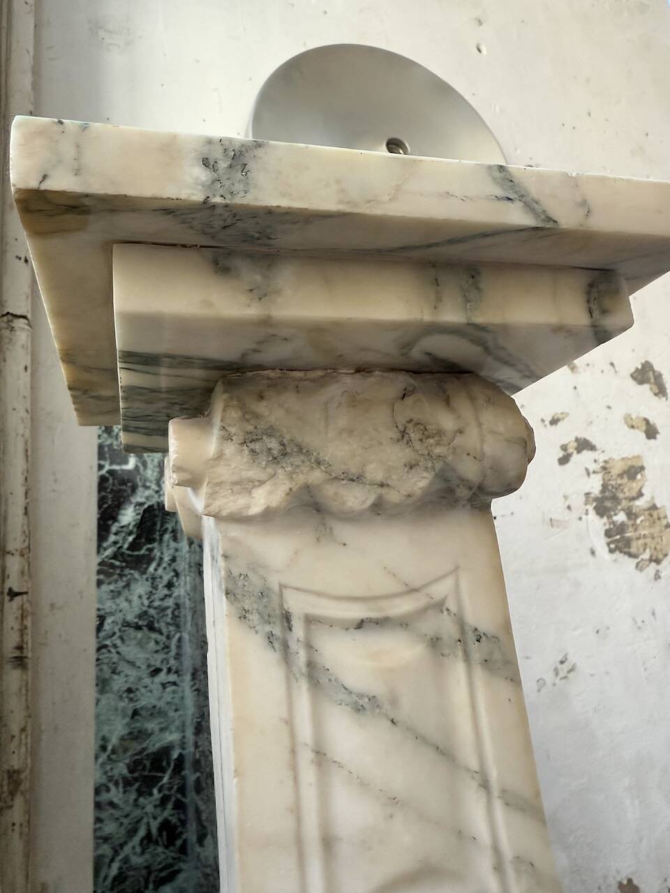 Set of 4 marble columns or pedestals.