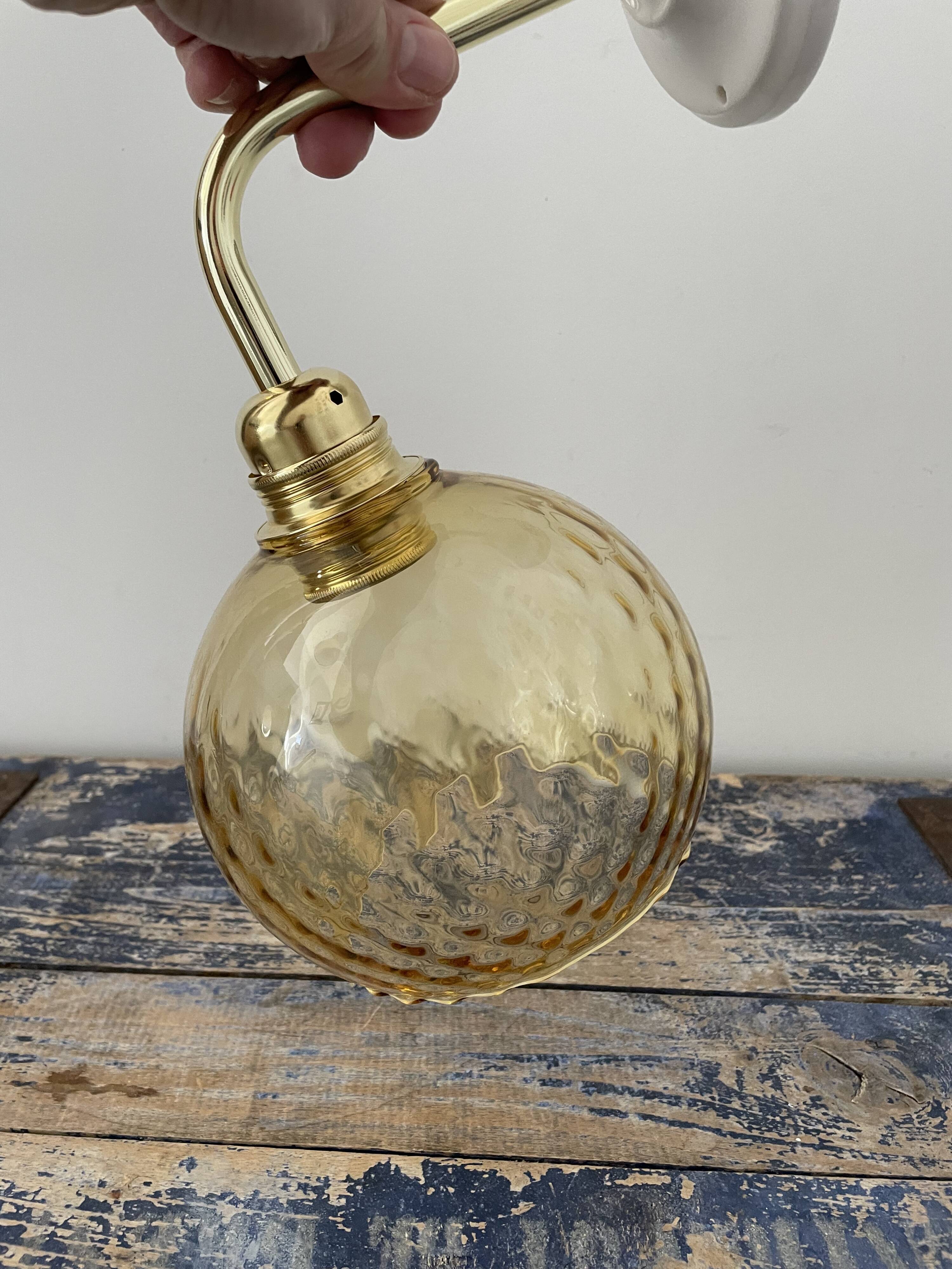 New electrified golden globe wall lamp