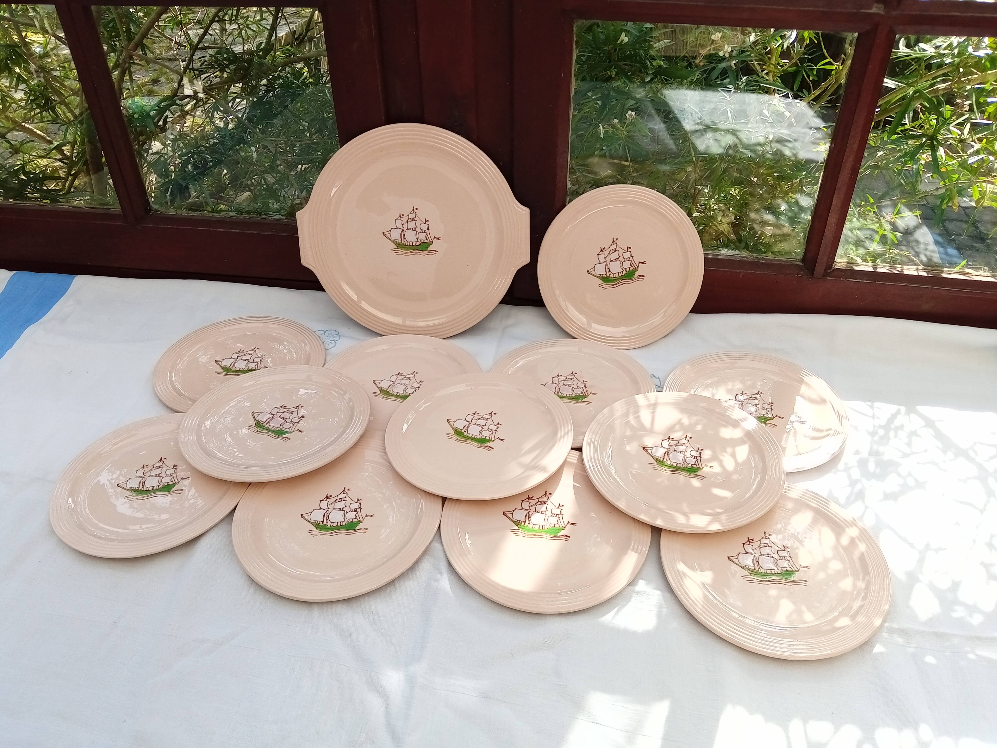Set of 12 dessert plates and Longwy dish