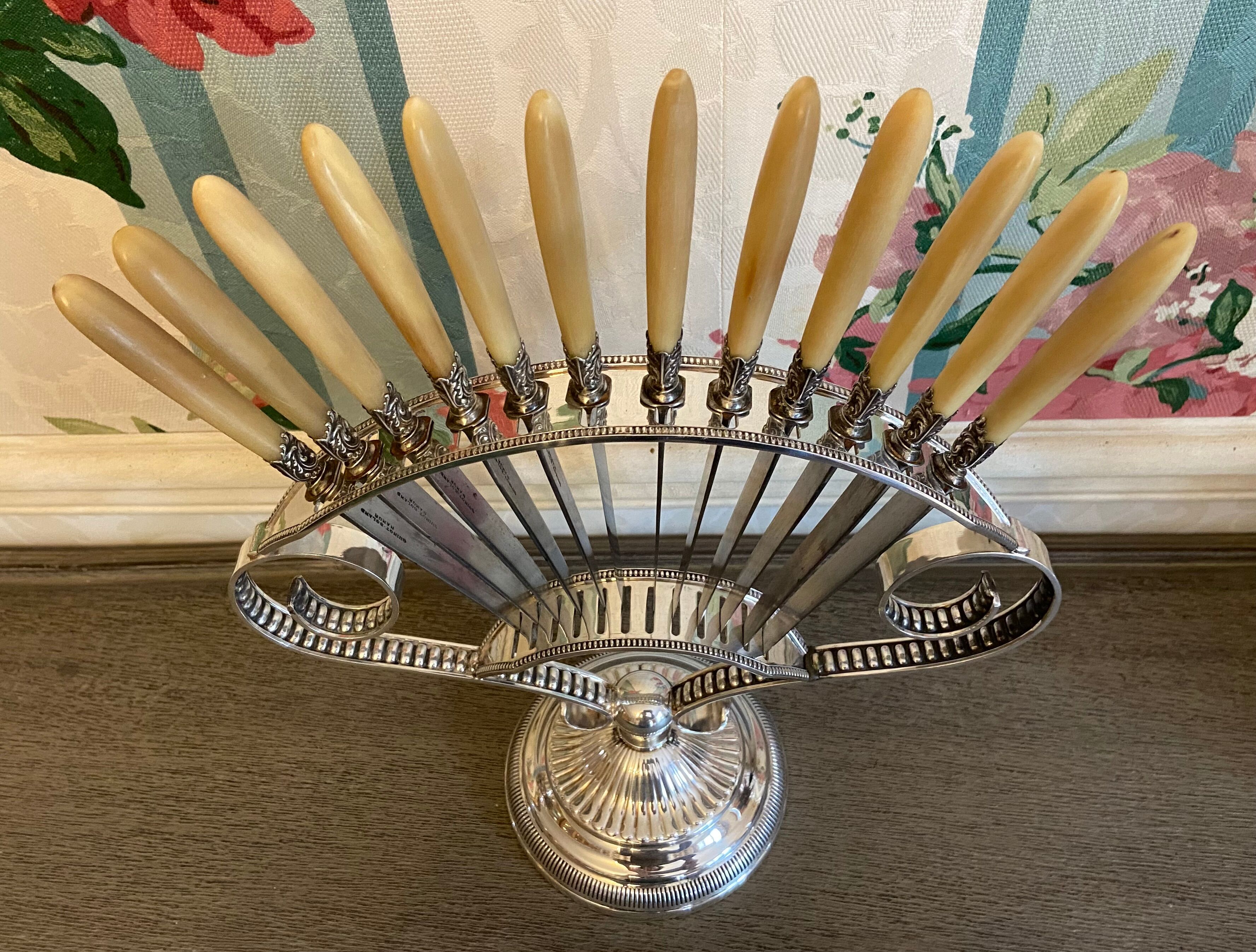 12 small antique knives and their fan knife holders