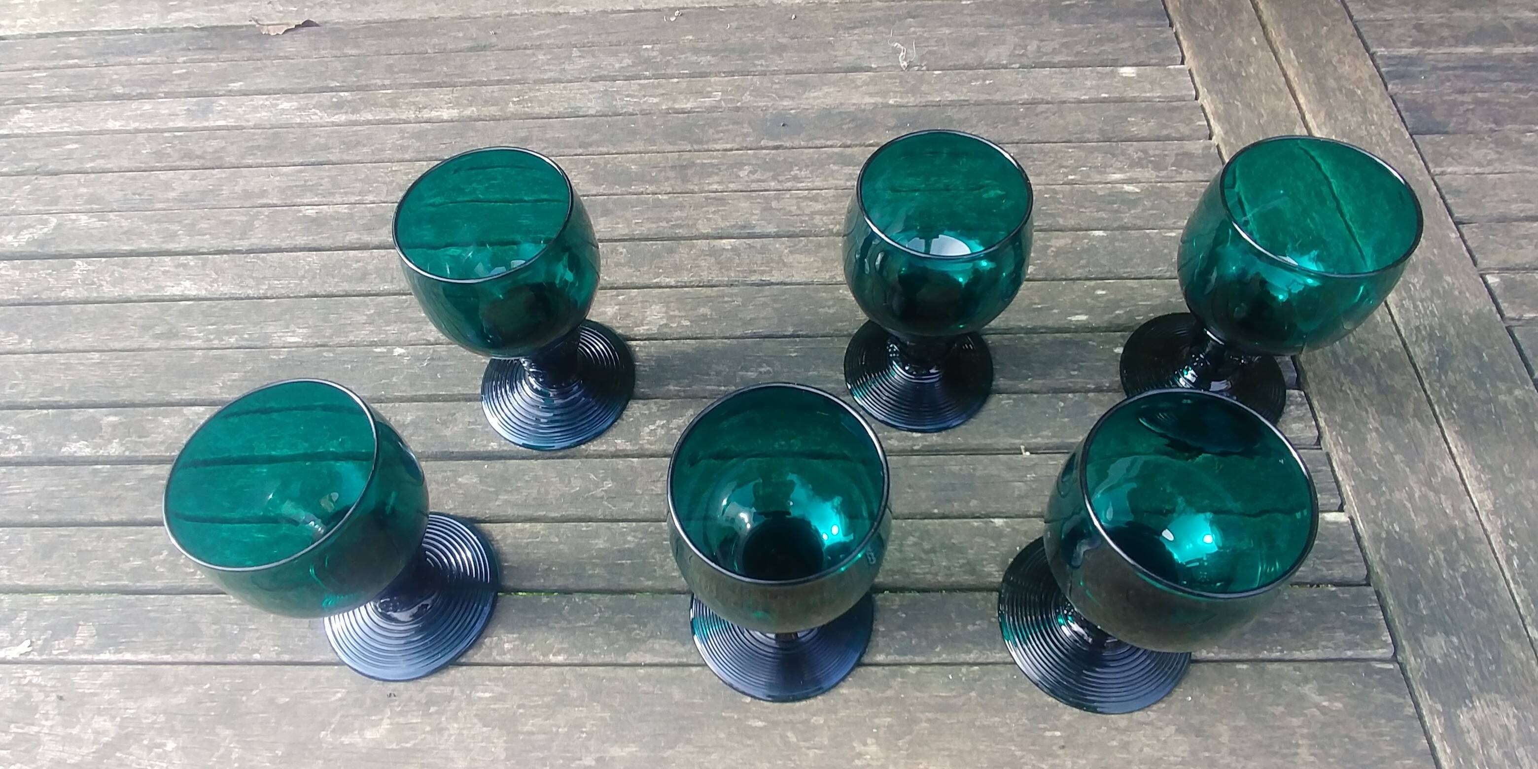 Six Roemer glasses in green blown crystal with "pastilles" decoration