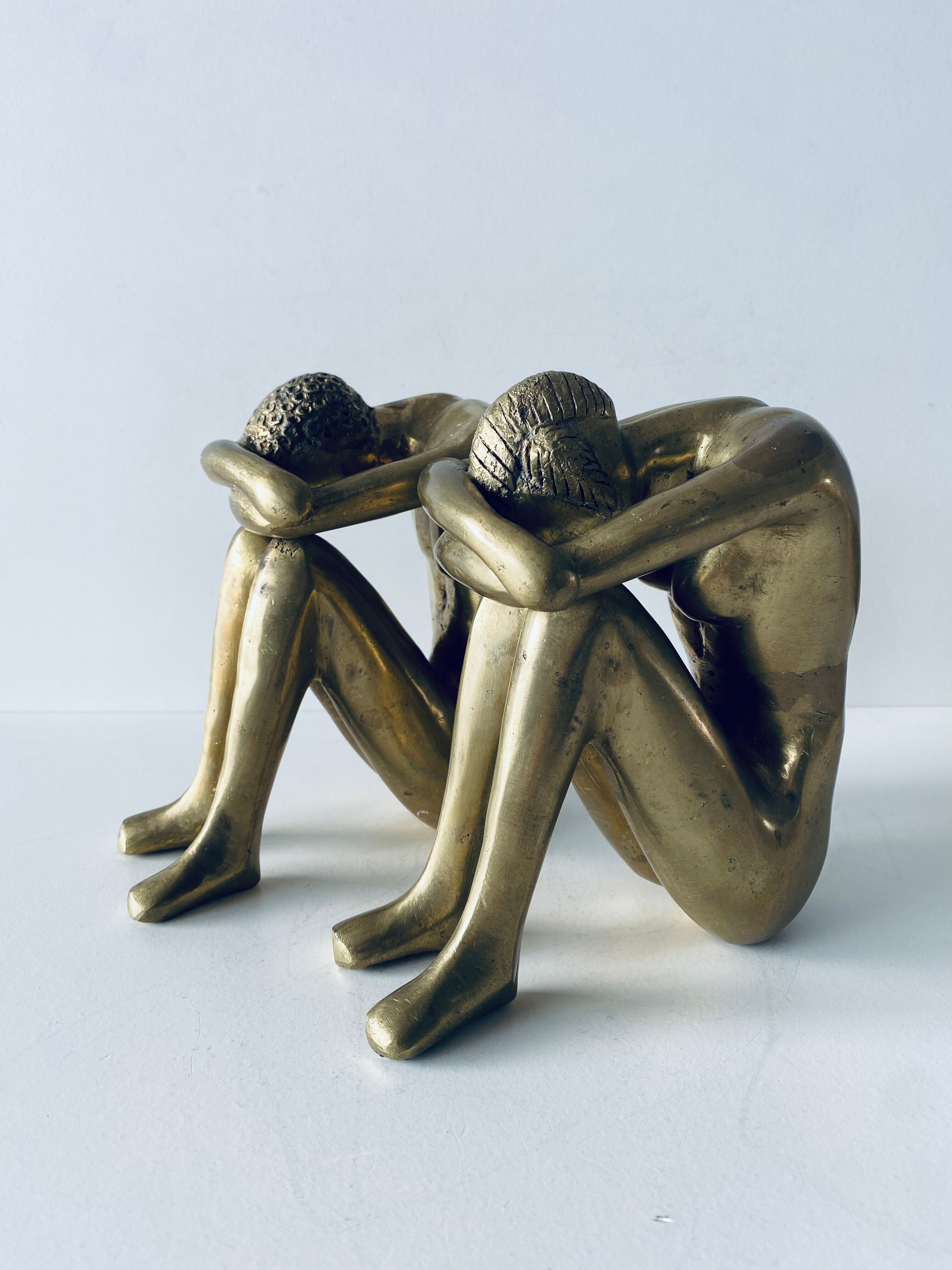 Couple carved in gilded bronze