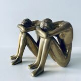 Couple carved in gilded bronze
