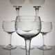 9 guilloche wine glasses, early 20th century