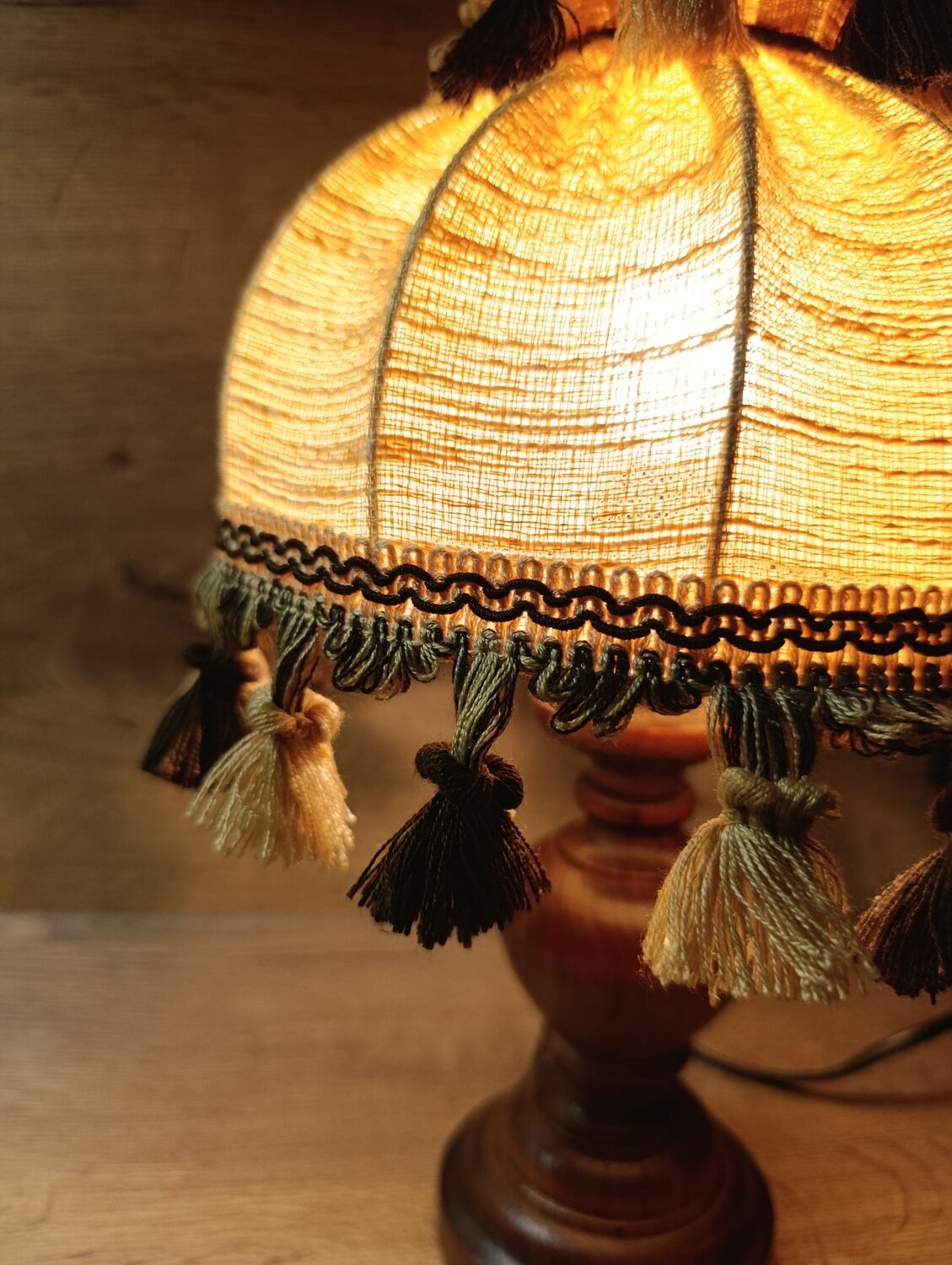 Wood bedside lamp with dome shade in granny chic style.