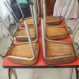 TABLE with two Italian EXTENSIONS and its 6 vintage CHAIRS of the 1970s in red color