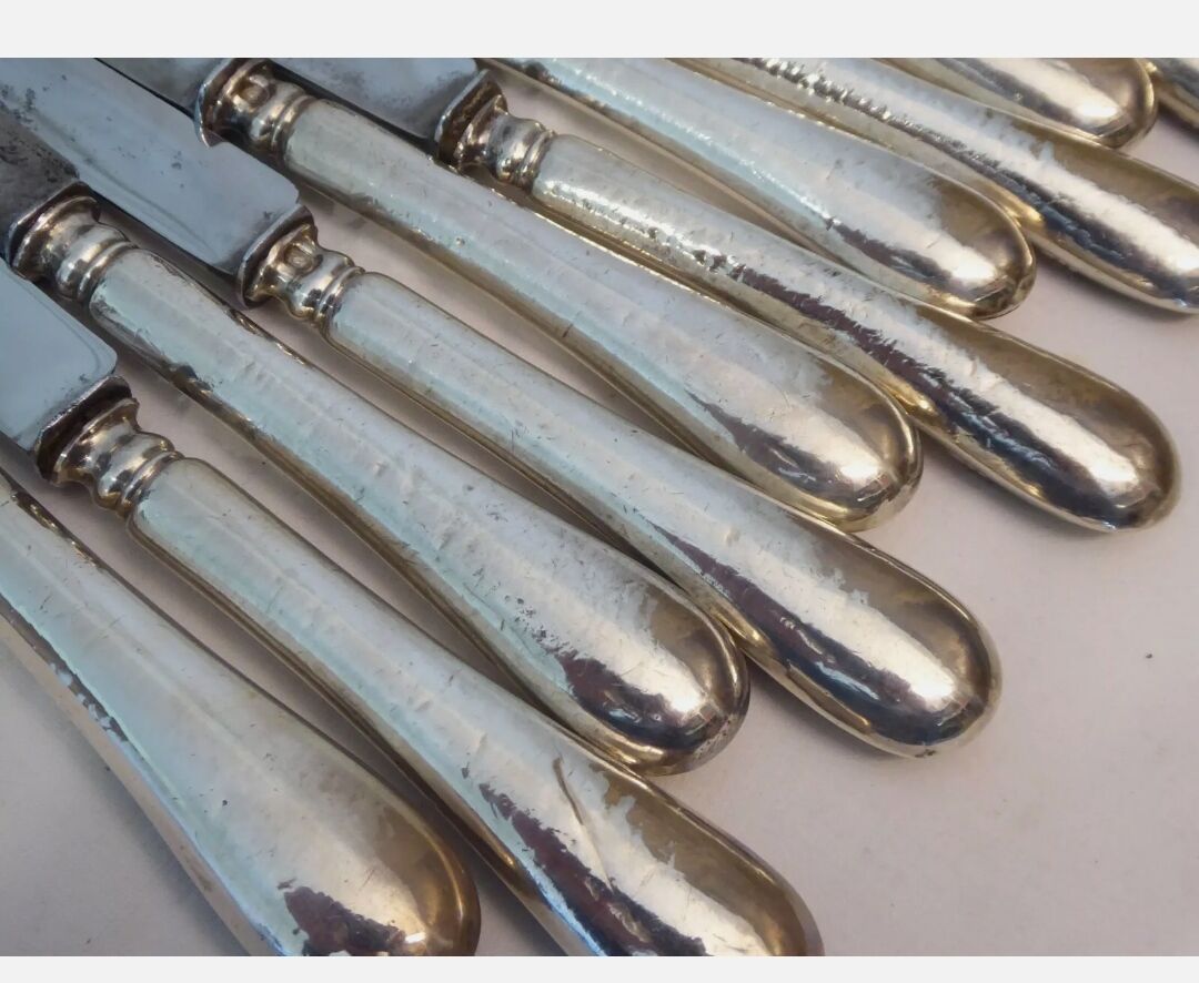 12 old filled silver handle knives