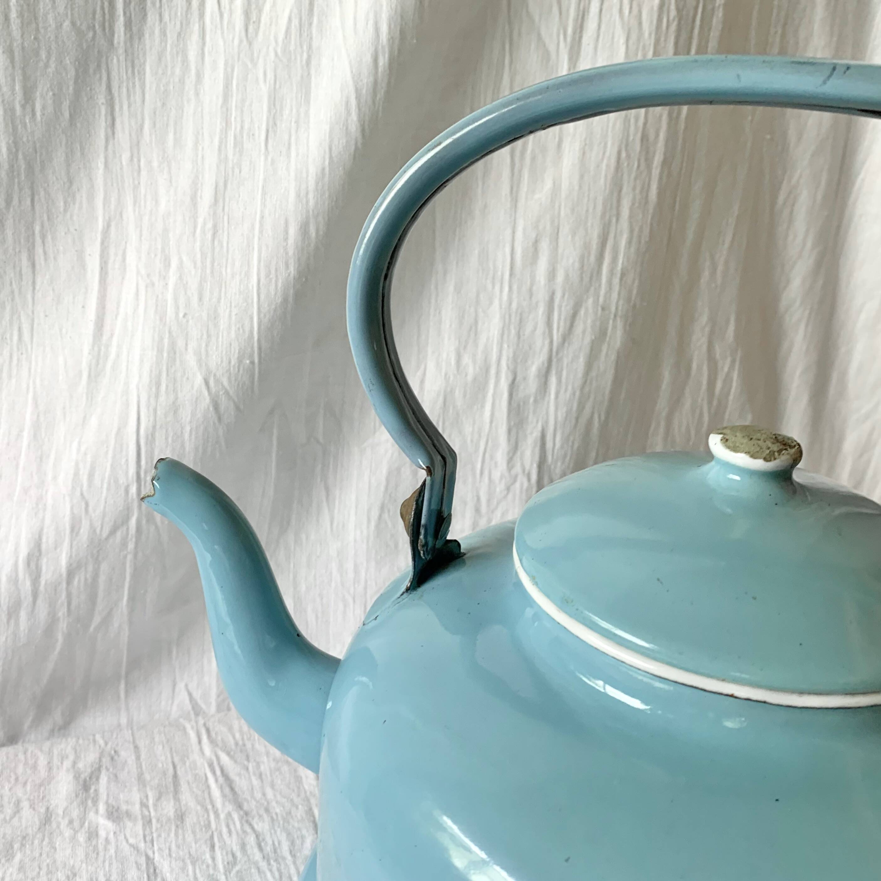 Large vintage kettle in blue enameled sheet metal
