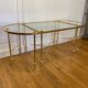 Table basse tripartite en laiton et verre