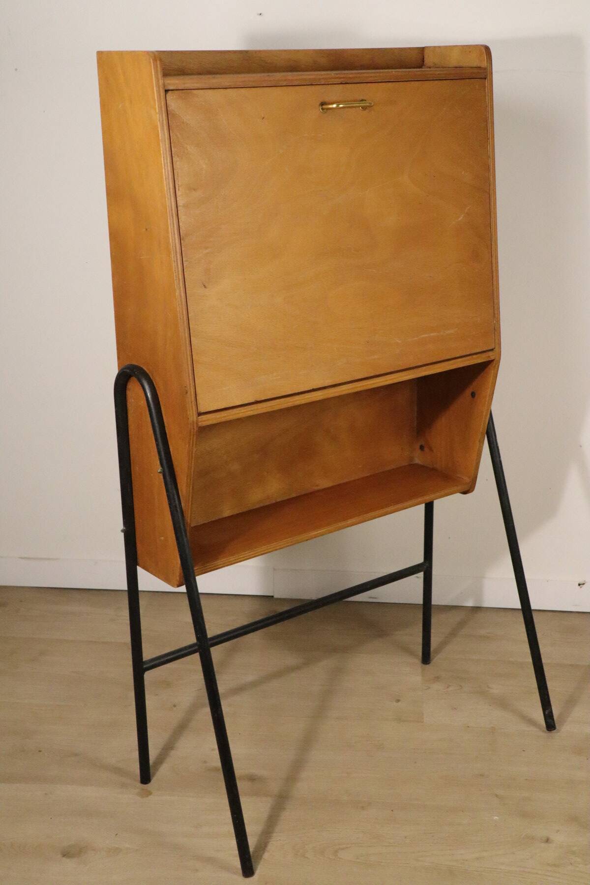 Vintage 1960s wooden secretary with metal legs.